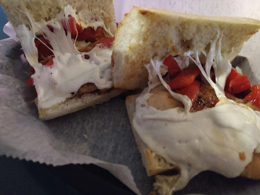 Grilled Chicken with Roasted Peppers and Mozzarella Cheese